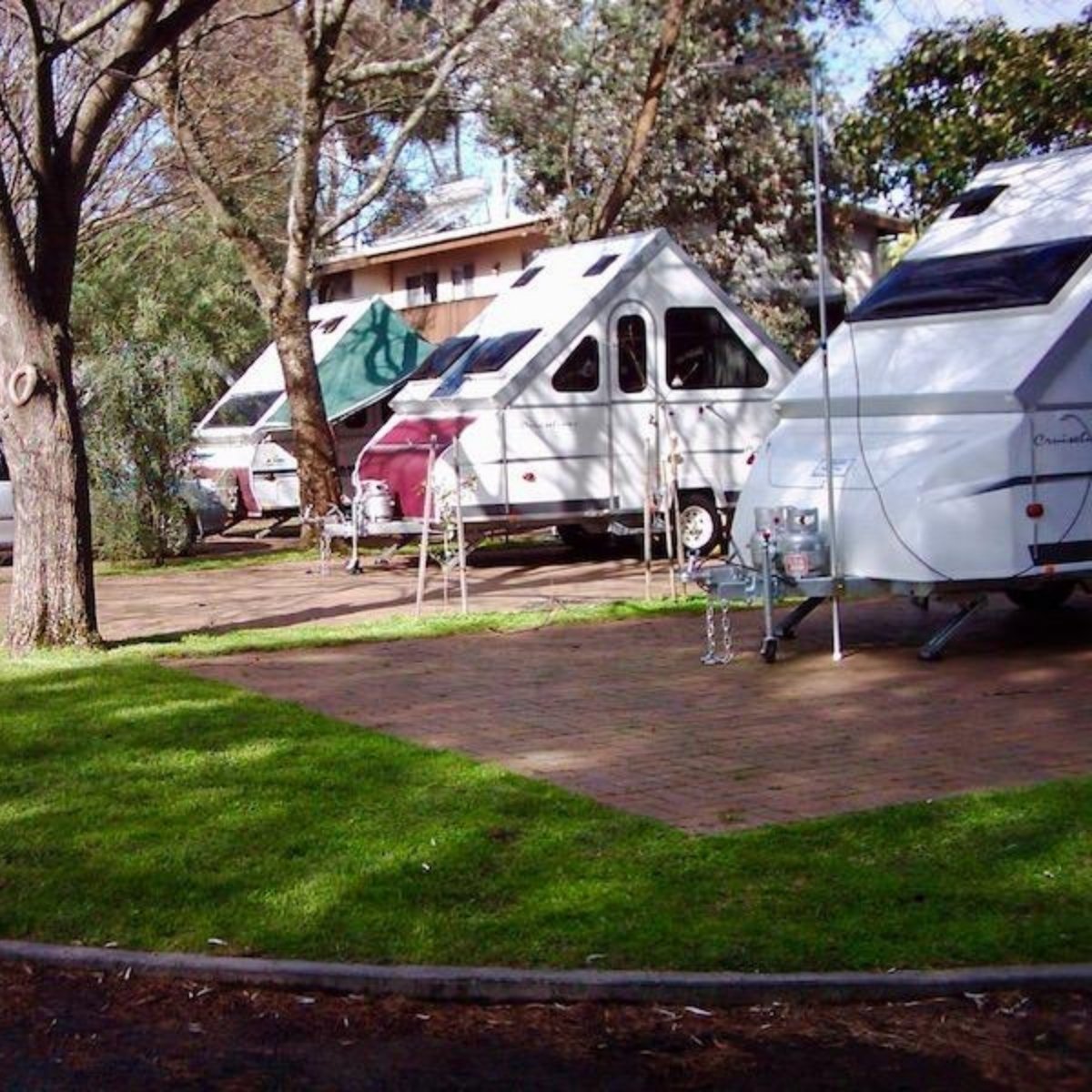 beach park tourist caravan park triangle caravans in a row