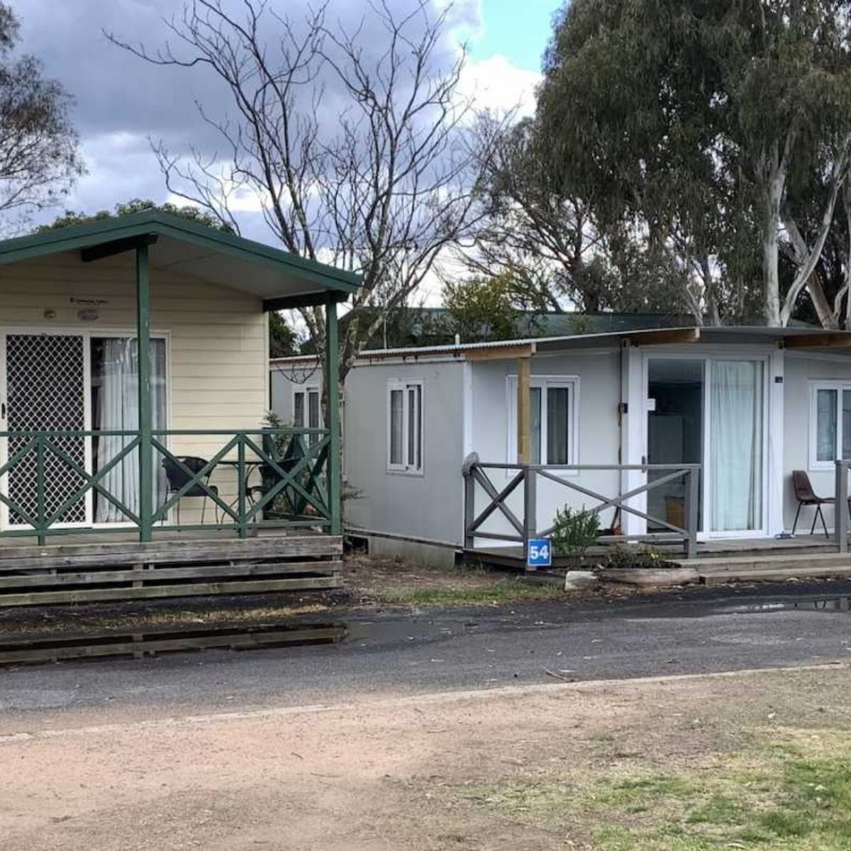 country road caravan park front of cabins